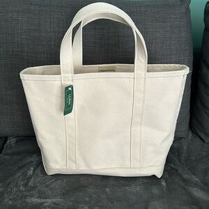 LL Bean canvas medium Boat and Tote.
Dimensions: 12"H x 13"W x 6"D.